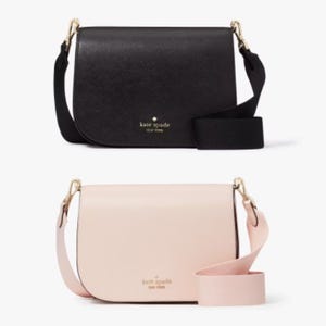 Two Kate Spade crossbody bags, one black and one light pink, both with adjustable straps.