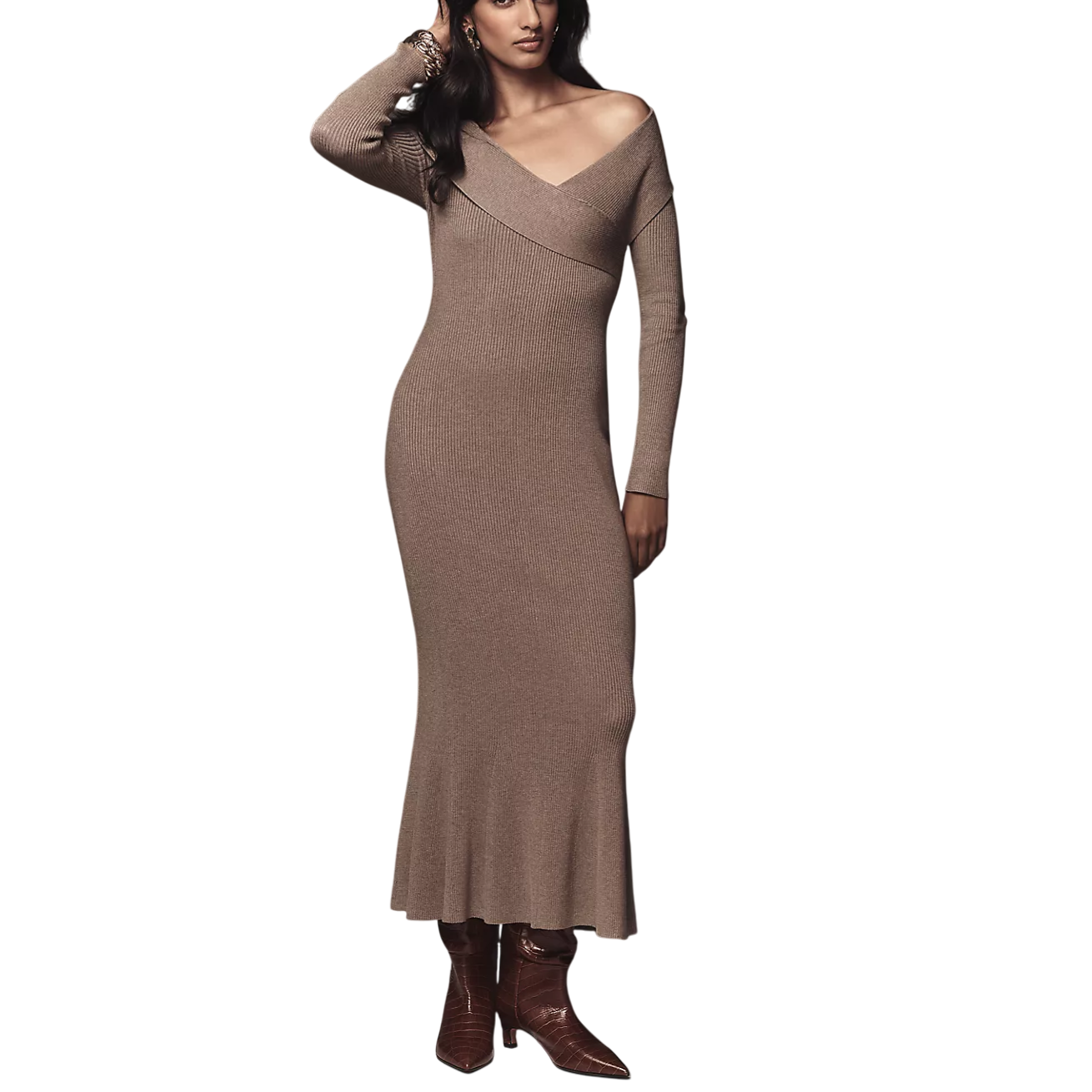 A woman wearing a brown, off-the-shoulder, ribbed knit dress paired with brown crocodile-patterned ankle boots.