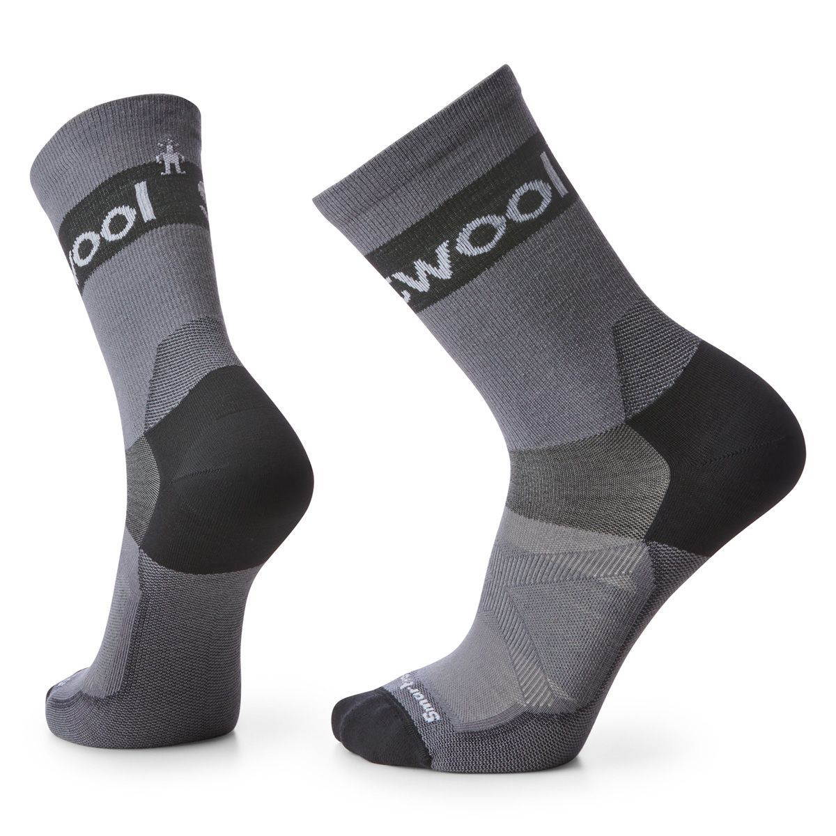 A pair of knee-high cycling socks with gray and black coloration and reinforced sections on the heel and toe.