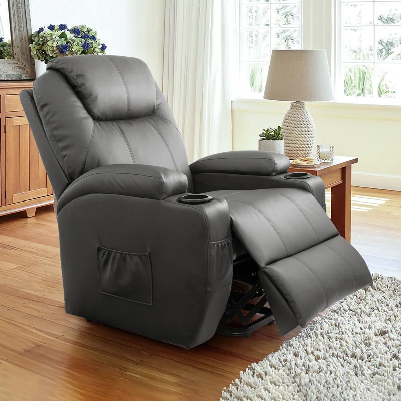 A gray recliner chair with an extended footrest, built-in cup holders, and a side storage pocket.