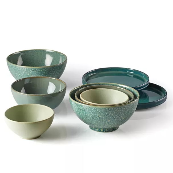 Lenox 8pc Luna Nesting Dinnerware Set includes various-sized bowls and plates in a soothing green and blue color palette with a speckled glaze design. The pieces nest together for compact storage.