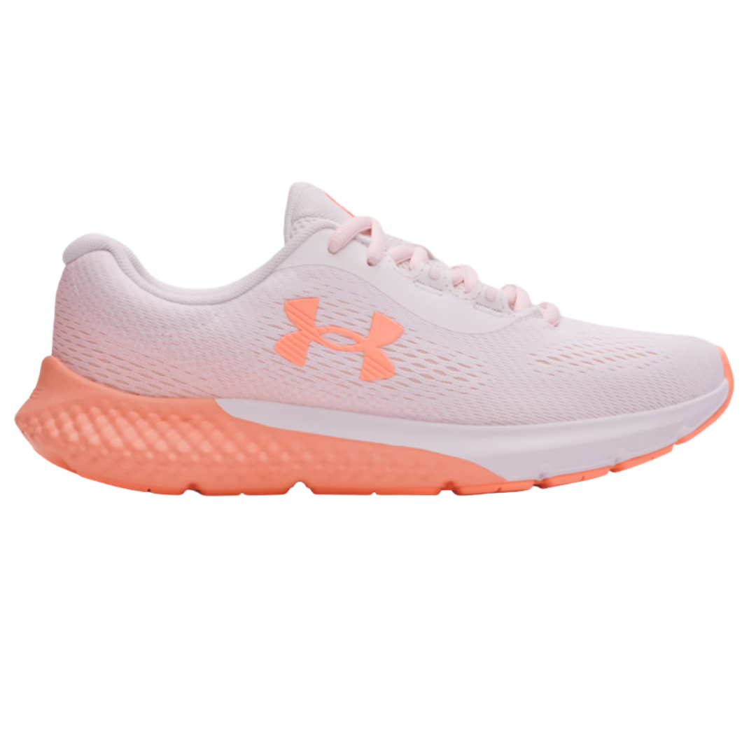 Under Armour running shoe featuring a white and peach color scheme with a mesh upper for breathability, a cushioned sole, and the brand's logo on the side.