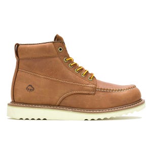 Wolverine Apprentice Work Boots feature a tan leather moc-toe design with yellow laces and a side logo. They have a white, rugged sole for traction.