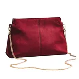 A crimson handbag with a gold chain strap.