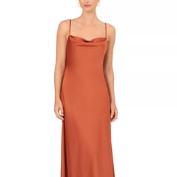 A sleeveless, cowl-neck slip dress in a rust color with thin straps and a fitted silhouette.