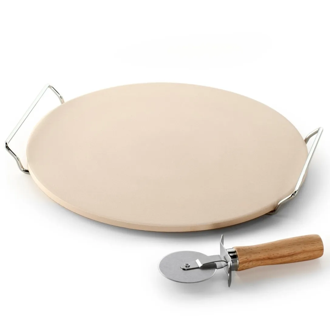 A round pizza stone with metal handles and a wooden-handled pizza cutter.