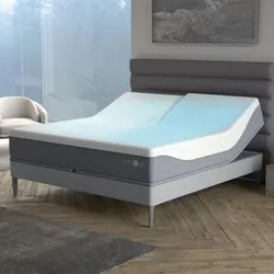 Adjustable bed with memory foam mattress featuring a dual-zone design for customizable head and foot elevation.