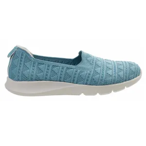 Light blue knit slip-on shoe with a textured pattern and white cushioned sole.