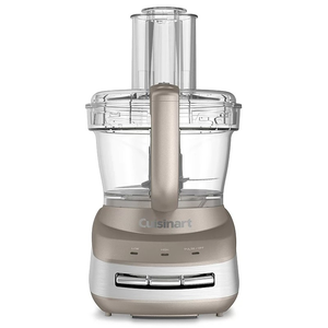 A metallic food processor with a clear plastic bowl and lid, featuring controls for low, high, and pulse settings.