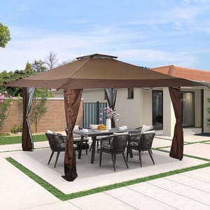A brown outdoor canopy covers a patio set with a rectangular table and six chairs. The setting includes a vase with flowers and tableware, situated in a paved backyard space.
