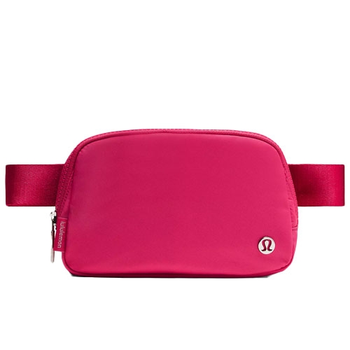 A pink Lululemon belt bag with a zippered main compartment and the brand's logo on the front.