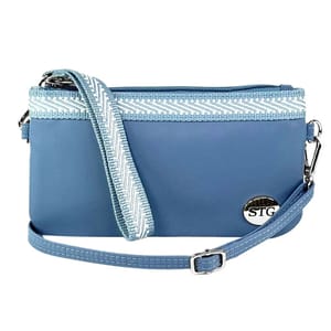 A blue crossbody bag with a removable strap and chevron-patterned trim. It features a silver \“STG\“ emblem.