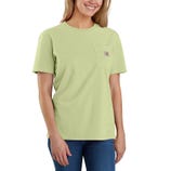 A woman is wearing a light green Carhartt T-shirt with a pocket logo on the chest, paired with blue jeans.