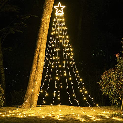 A string of LED lights creates the silhouette of a Christmas tree with a lit star on top, attached to a tree and extending to the ground.