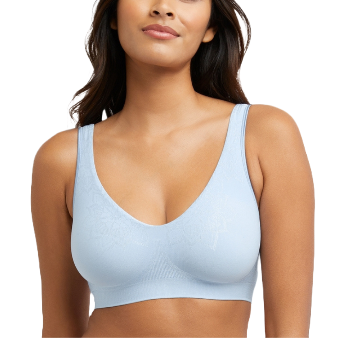 Light blue seamless wireless bra with ComfortFlex Fit, featuring a scoop neckline, wide straps, and subtle textured pattern for added comfort and support.