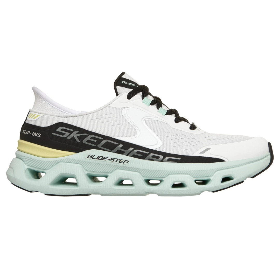 Skechers Glide-Step footwear featuring a white and black design with mint green outsole and perforations for cushioning.