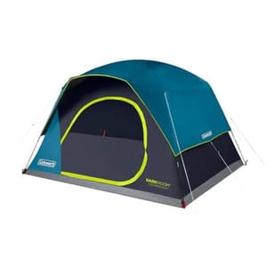 A Coleman 6-person tent featuring Dark Room Technology, with a blue and gray color scheme, neon green accents, and a dome shape designed to reduce sunlight and heat, ensuring a cooler and darker interior.