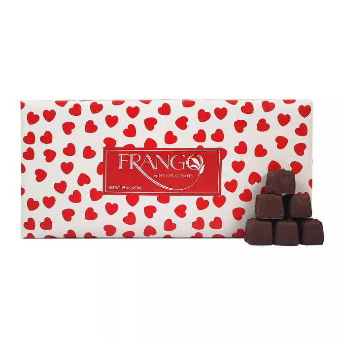 Box of Frango Mint Chocolates with a red heart-patterned design, accompanied by a small stack of chocolate pieces.
