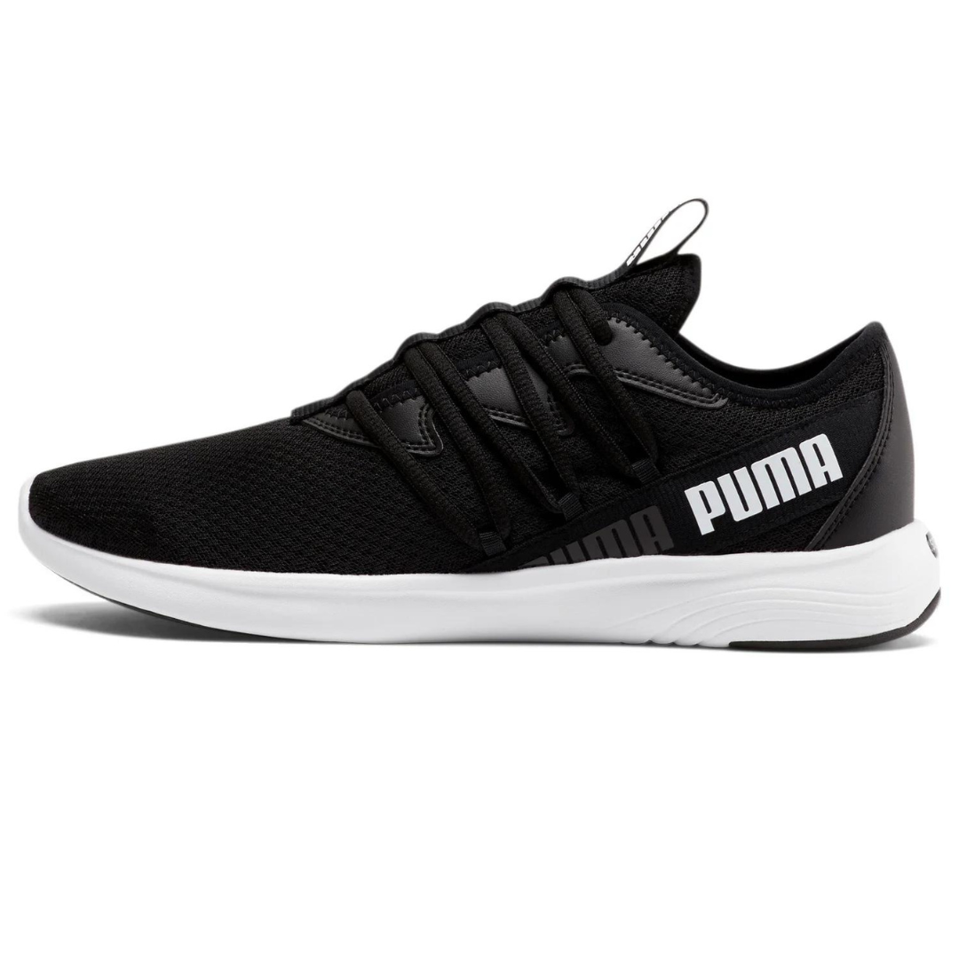 Black Puma Men's Star Vital sneakers with white soles, featuring a prominent Puma logo on the side, a breathable upper fabric, and a lace-up front.