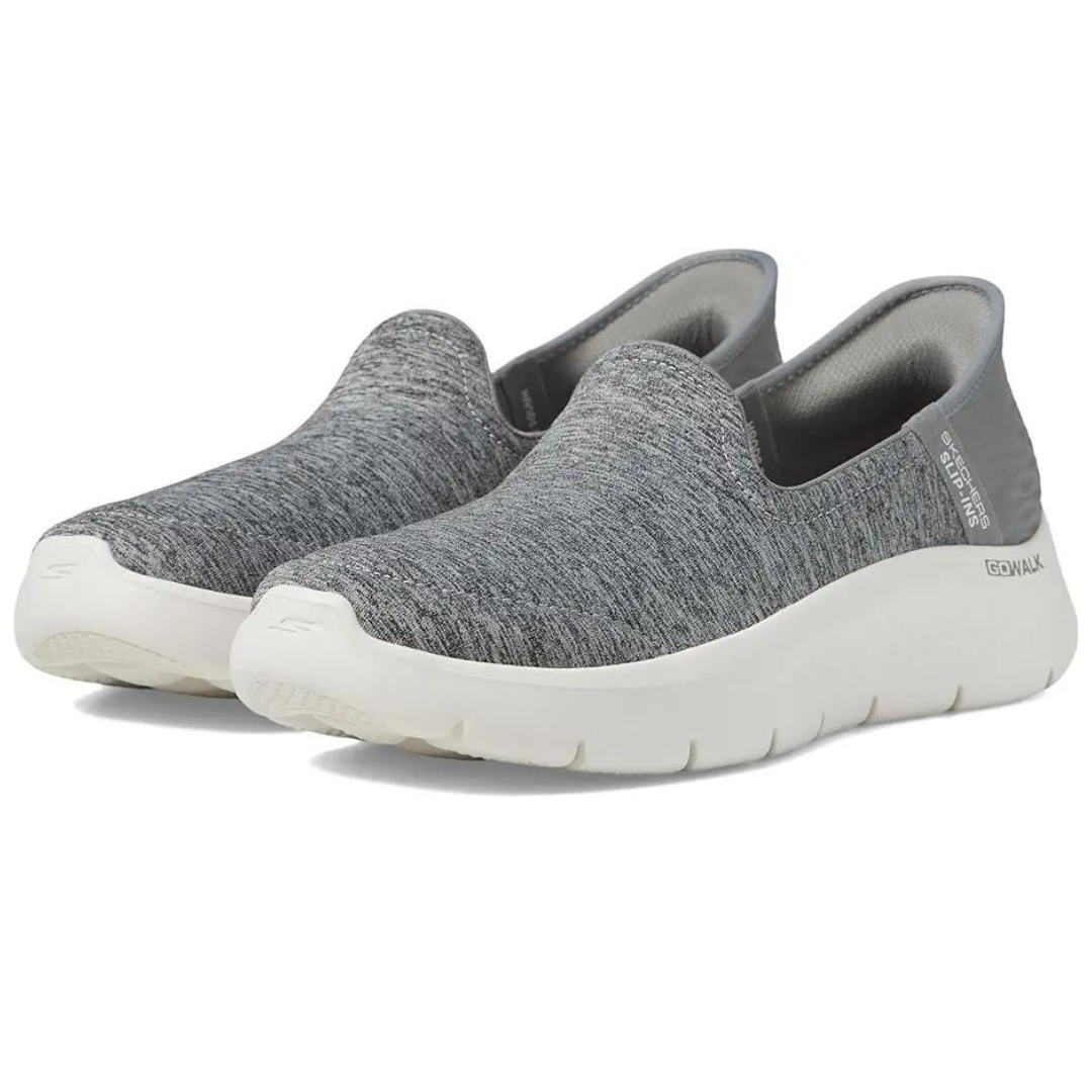 A pair of gray Skechers GOwalk slip-on shoes with a white sole.