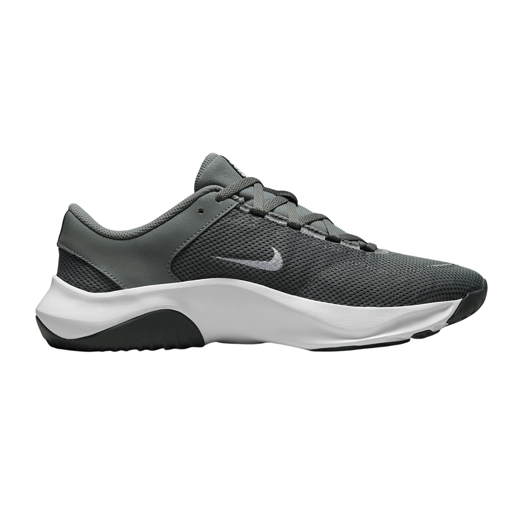 A gray and black athletic shoe with a white sole and a small swoosh logo on the side.