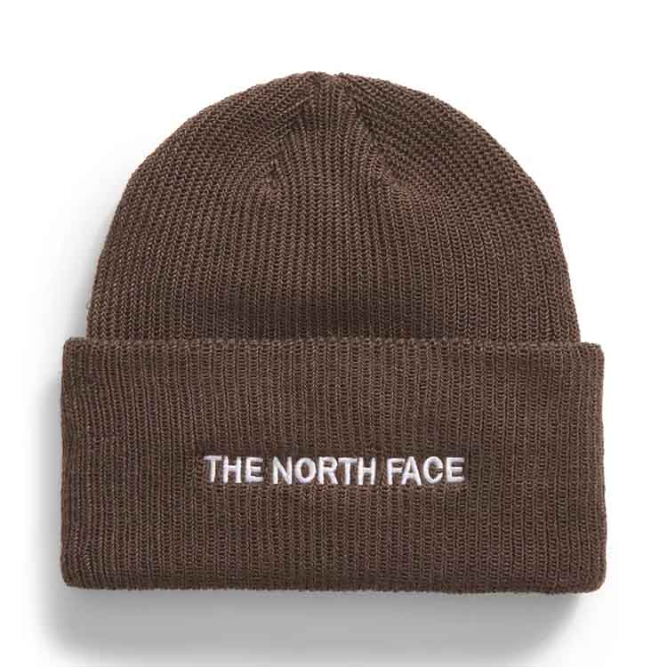 Brown knitted beanie with \“THE NORTH FACE\“ embroidered in white on the folded brim; designed for urban style and warmth.