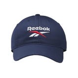 A navy blue Reebok baseball cap with the Reebok logo embroidered in white and red on the front.