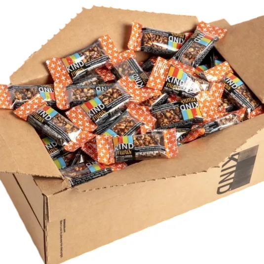 Box of KIND Minis, Peanut Butter Dark Chocolate flavor, wrapped in orange and black packaging with colorful text, containing 100 calories per bar.