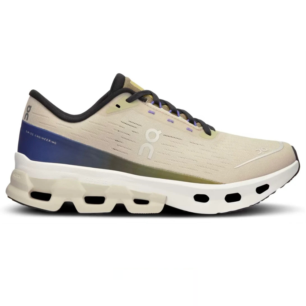 A beige and blue athletic shoe with distinctive cushioning and ventilation holes, featuring the \“on\“ logo and labeled \“Swiss Engineering\“ on the heel.