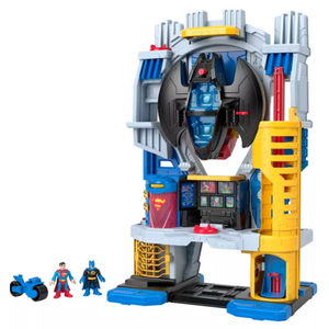 Imaginext DC Super Friends Bat-Tech Batcave playset featuring a tall, interactive structure with Batman and Superman figures and a motorcycle.