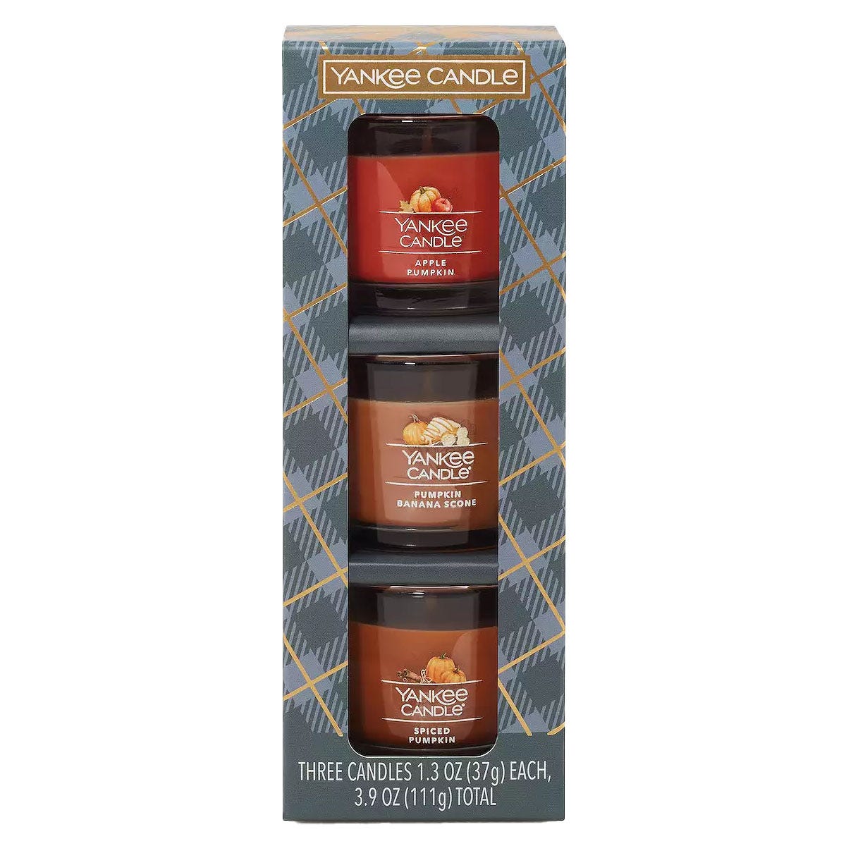 Yankee Candle set with three 1.3 oz votive candles in Apple Pumpkin, Pumpkin Banana Scone, and Spiced Pumpkin scents.