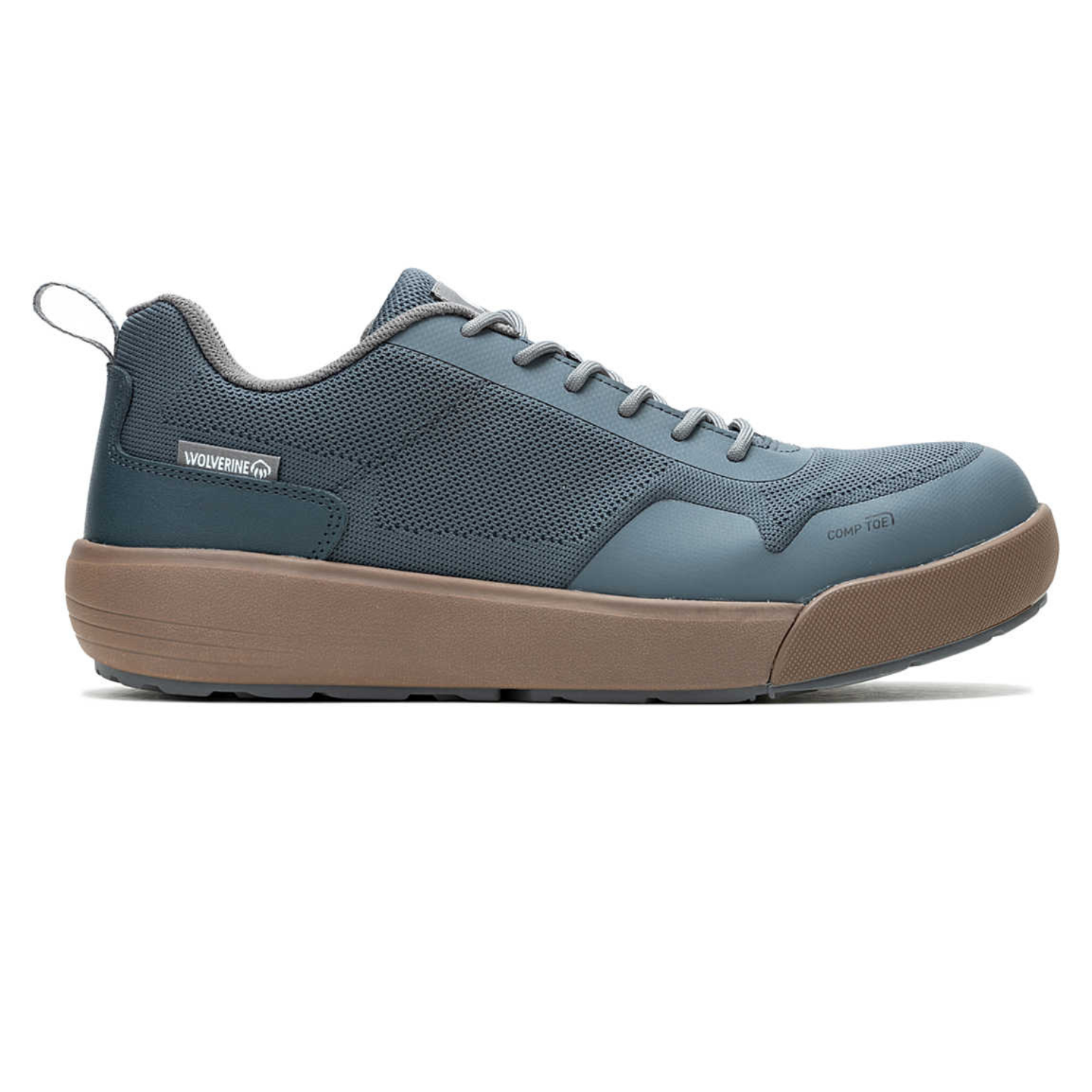 Wolverine Dart Knit Work Shoes feature a blue mesh upper with a composite safety toe and a tan slip-resistant sole. They have a casual sneaker style with a pull tab at the heel and are designed for safety and comfort.