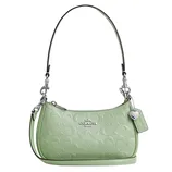 A green Coach shoulder bag with an embossed logo pattern, silver hardware, and an adjustable strap.