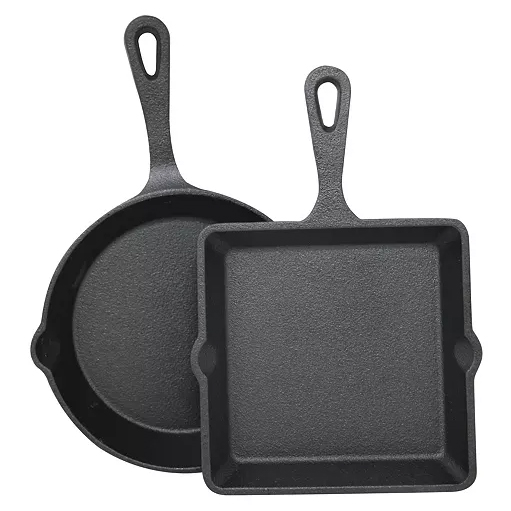 A pair of black cast iron skillets, one round and one square, each with a handle featuring a hole for hanging. They have a textured surface suitable for cooking.
