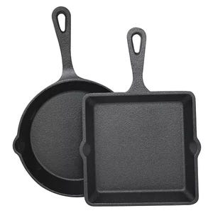 A pair of black cast iron skillets, one round and one square, each with a handle featuring a hole for hanging. They have a textured surface suitable for cooking.