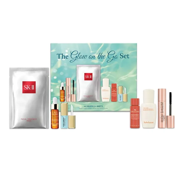 \“The Glow on the Go Set\“ includes SK-II Facial Treatment Mask, Origins moisturizer, Sulwhasoo products, and mascara, designed for Macy's.
