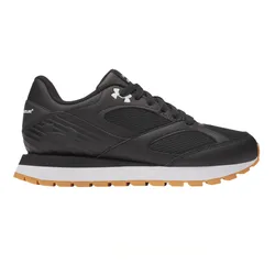 Black athletic sneaker with a low-top design, featuring mesh and leather upper, white midsole, and gum outsole. The shoe includes a logo on the side and back.