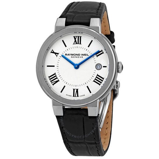 Raymond Weil Women's Jasmine Watch features a silver-tone round case and a white dial with Roman numerals, blue hands, and a date window at 3 o'clock. It has a black leather strap and emphasizes a classic, elegant design.
