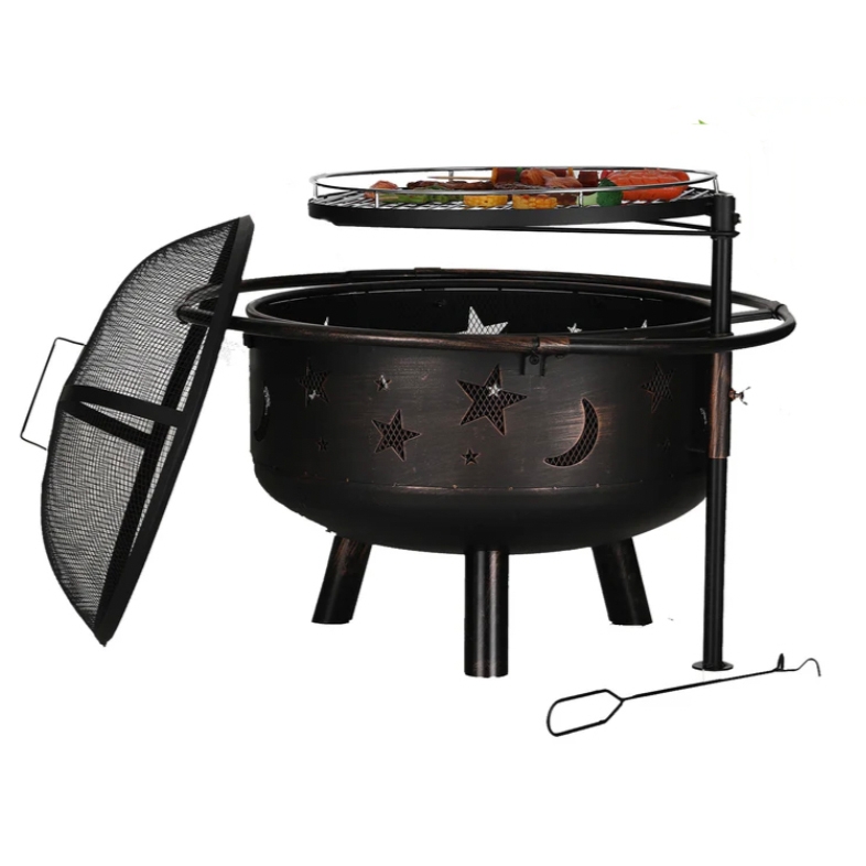 A black fire pit features star and moon cutouts, a swivel grill rack, a spark screen cover, and a fire poker. It stands on four legs and has side handles.