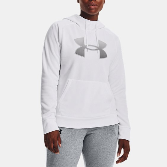 A person is wearing a white hoodie with a logo on the front and gray sweatpants.