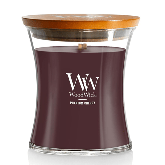 WoodWick Phantom Cherry candle with a wooden lid and flared glass jar design, featuring a wooden wick.