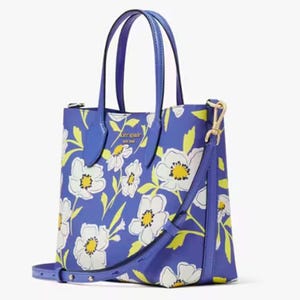 Blue floral-patterned tote bag with shoulder strap and handles.