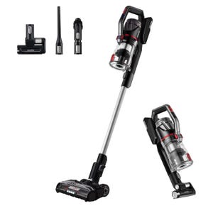 Cordless vacuum cleaner with a motorized brush head and additional attachments, including a crevice tool and a small motorized brush.