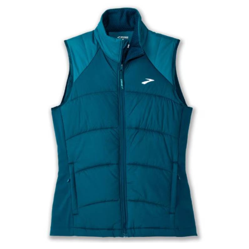 Teal sleeveless zip-up vest with a high collar, featuring a quilted design for insulation. The vest includes a small logo on the chest and front pockets.