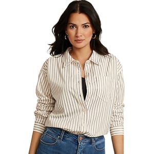 A woman is wearing a striped long-sleeve shirt with a collar, paired with blue jeans.