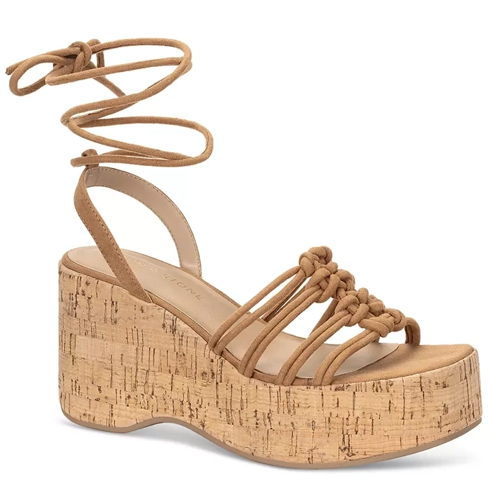 Brown strappy platform sandal with a cork-style block heel and lace-up ankle ties.