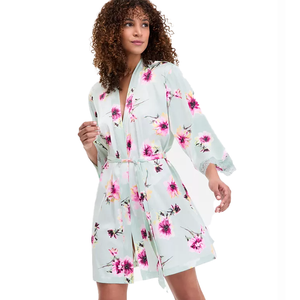 A knee-length, light green satin robe with pink floral patterns, featuring lace-trimmed sleeves and a matching belt for a secure fit.