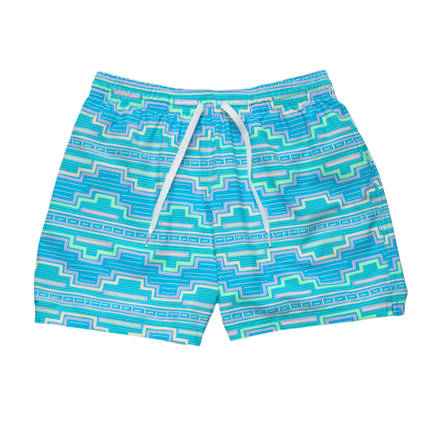 A pair of men's swim trunks featuring a vibrant geometric pattern in blue, teal, and white, with an elastic waistband and a white drawstring.