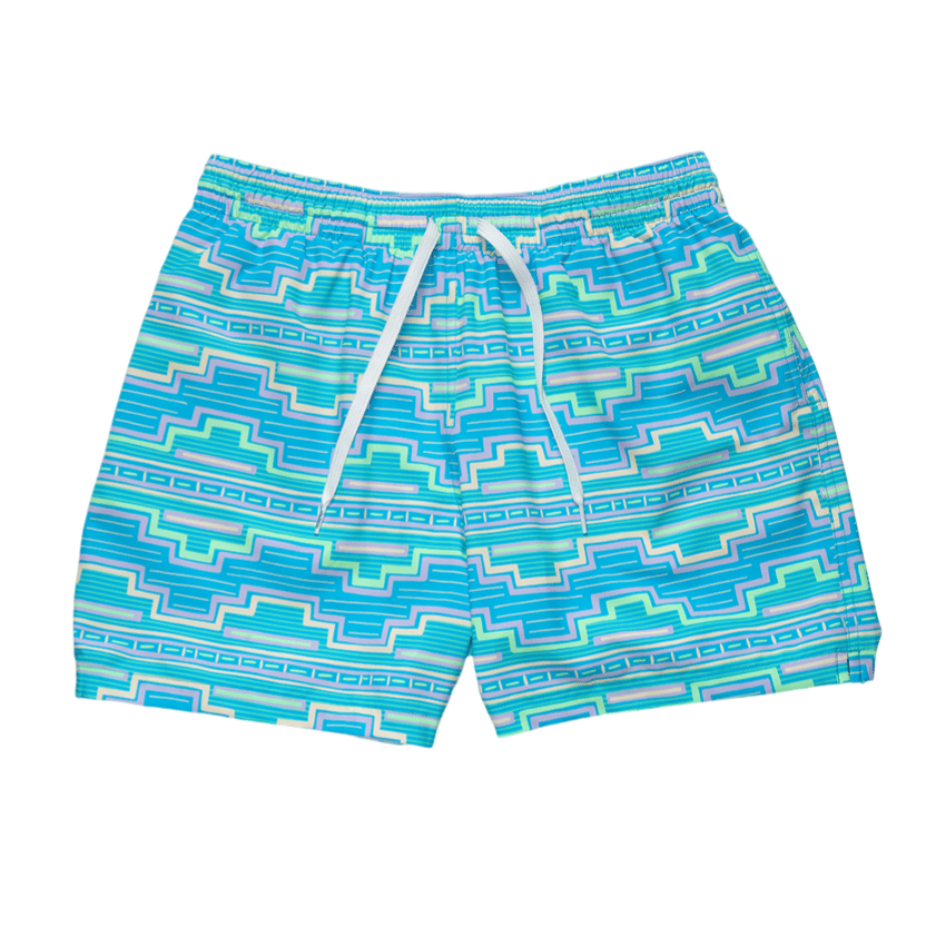 A pair of men's swim trunks featuring a vibrant geometric pattern in blue, teal, and white, with an elastic waistband and a white drawstring.