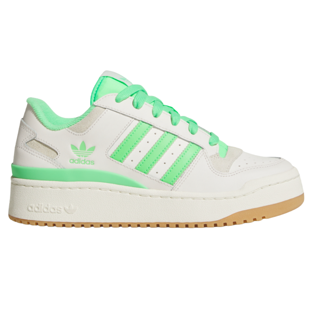 White and green Adidas sneaker with gum sole, featuring the brand's three stripes and logo on the side.